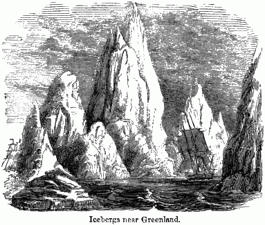 Icebergs near Greenland. Two ships sailing around large icebergs.
