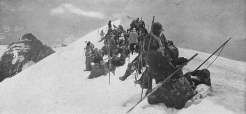 The Mountaineers lunching in a crevasse on White Glacier.