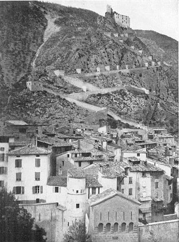 THE LONG LINES OF WALLS THAT ZIGZAG DOWN THE HILLSIDE