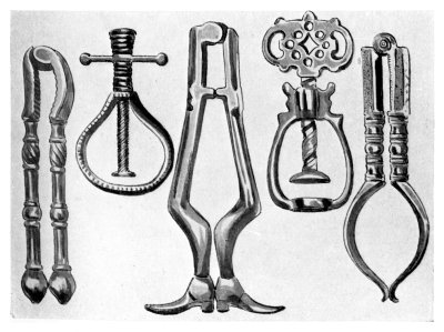 FIGS. 35-39.—EARLY STEEL AND BRASS NUTCRACKERS.  (In the collection of Mr. Charles Evans, of Nailsea Court.)