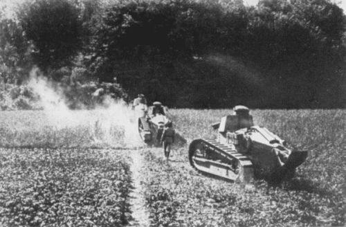 FIRST OF THE GREAT FRANCO-AMERICAN COUNTER-OFFENSIVE AT CHÂTEAU-THIERRY. THE FRENCH BABY TANKS, KNOWN AS "CHARS D'ASSAUTS," ENTERING THE WOOD OF VILLERS-COTTERETS, SOUTHWEST OF SOISSONS