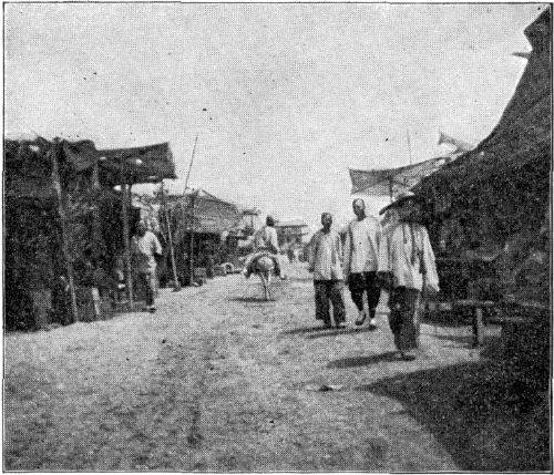 SCENE IN A TOWN OF WESTERN CHINA. SCENE IN A TOWN OF WESTERN CHINA.
