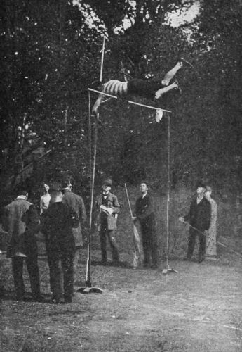 POLE VAULT AT THE I.-C. GAMES. Simpson clearing the bar at 10 feet.
