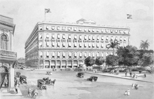 THE GOMEZ BUILDING  One of the finest business buildings in Havana is the great Gomez Building, which occupies an entire block fronting upon the beautiful Central Park and reached by way of the Prado. Although only five stories in height, it vies in appearance and commodiousness with the best business buildings in any American city. Its site was well chosen for the display of its handsome architecture and commanding proportions, and it stands in proximity to the National Theatre and other noteworthy structures.
