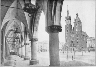 THE MARKET SQUARE IN CRACOW Here Poland mourns her glorious past, and the returned immigrant assures her of a glorious future.