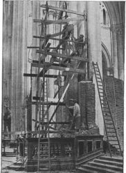 TAKING DOWN THE STATUES IN TRANSEPT.