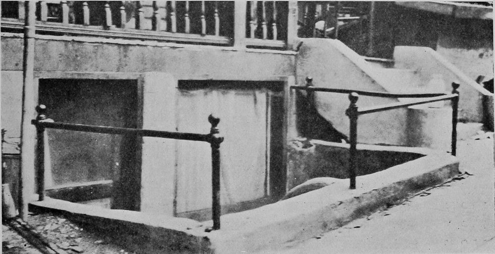“Basement” Occupied by a Migrant Family. The Only Opening in this Dwelling Appears in the Picture.