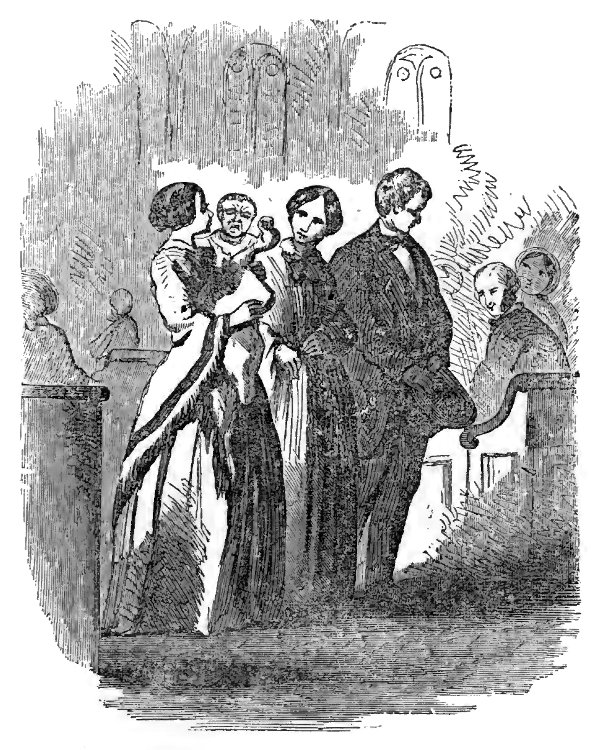 Infant crying in his mother’s arms after baptism.