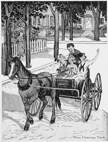 Children riding in the buckboard