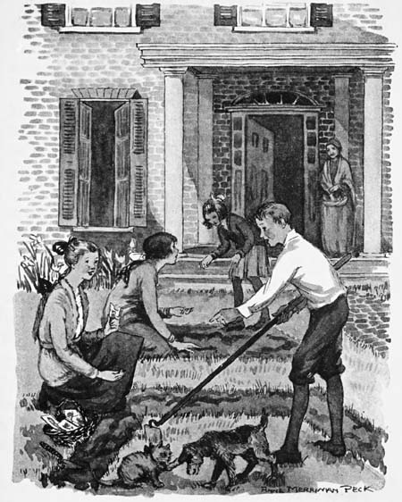 Children planting flower seeds