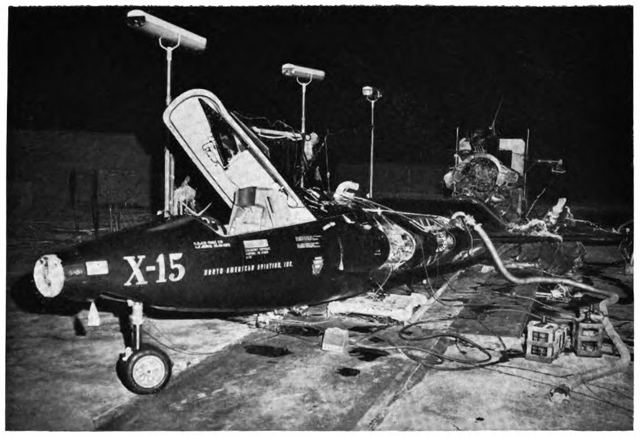 A picture of the X⁠-15 with the cockpit open and a hose coming from it