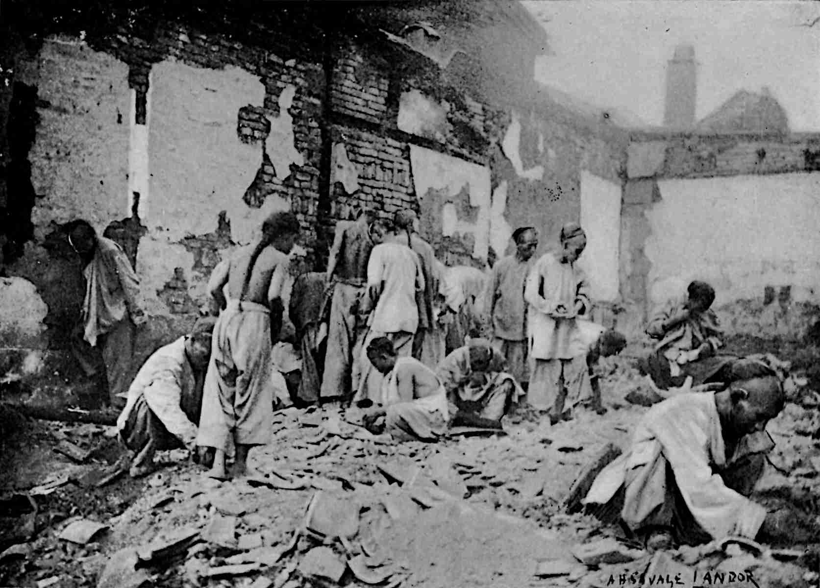 Many people searching among ruins