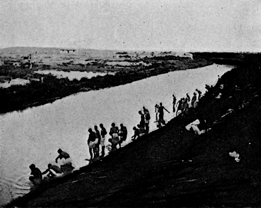 Many people along a river